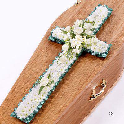 <h2>Extra Large Classic Cross-Shaped Design with White Roses | Funeral Flowers</h2>
<br>
<ul>
<li>Approximate Size W 56cm H 160cm</li>
<li>Hand created extra-large classic white cross in fresh flowers</li>
<li>To give you the best we may occasionally need to make substitutes</li>
<li>Funeral Flowers will be delivered at least 2 hours before the funeral</li>
<li>For delivery area coverage see below</li>
</ul>
<br>
<h2>Liverpool Flower Delivery</h2>
<br>
<p>We have a wide selection of Funeral Crosses offered for Liverpool Flower Delivery. Funeral Crosses can be provided for you in Liverpool, Merseyside and we can organize Funeral flower deliveries for you nationwide. Funeral Flowers can be delivered to the Funeral directors or a house address. They can not be delivered to the crematorium or the church.</p>
<br>
<h2>Flower Delivery Coverage</h2>
<br>
<p>Our shop delivers funeral flowers to the following Liverpool postcodes L1 L2 L3 L4 L5 L6 L7 L8 L11 L12 L13 L14 L15 L16 L17 L18 L19 L24 L25 L26 L27 L36 L70 If your order is for an area outside of these we can organise delivery for you through our network of florists. We will ask them to make as close as possible to the image but because of the difference in stock and sundry items it may not be exact.</p>
<br>
<h2>Liverpool Funeral Flowers | Crosses</h2>
<br>
<p>This extra-large classic funeral cross has been loving handcrafted by our expert florists and features a mass of white spray chrysanthemums, together with a spray of white roses and freesia and luscious green foliage completes this traditional design.</p>
<br>
<p>Funeral crosses are symbols of belief they reaffirm faith and provide comfort at this difficult time.</p>
<br>
<p>In the larger sizes (from 4ft up) they are appropriate as the main tribute but smaller sizes are sometimes chosen by close friends as they represent extremely personal sentiments and feelings.</p>
<br>
<p>Containing 45 white double spray chrysanthemums, 11 white large-headed roses, 14 white freesia and seasonal mixed foliage.</p>
<br>
<h2>Best Florist in Liverpool</h2>
<p>Trust Award-winning Liverpool Florist, Booker Flowers and Gifts, to deliver funeral flowers fitting for the occasion delivered in Liverpool, Merseyside and beyond. Our funeral flowers are handcrafted by our team of professional fully qualified who not only lovingly hand make our designs but hand-deliver them, ensuring all our customers are delighted with their flowers. Booker Flowers and Gifts your local Liverpool Flower shop.</p>
<br>
<p><em>Janice Crane - 5 Star Review on Google - Funeral Florist Liverpool</em></p>
<br>
<p><em>I recently had to order a floral tribute for my sister in laws funeral and the Booker Flowers team created a beautifully stunning arrangement. Thank you all so much, Janice Crane.</em></p>